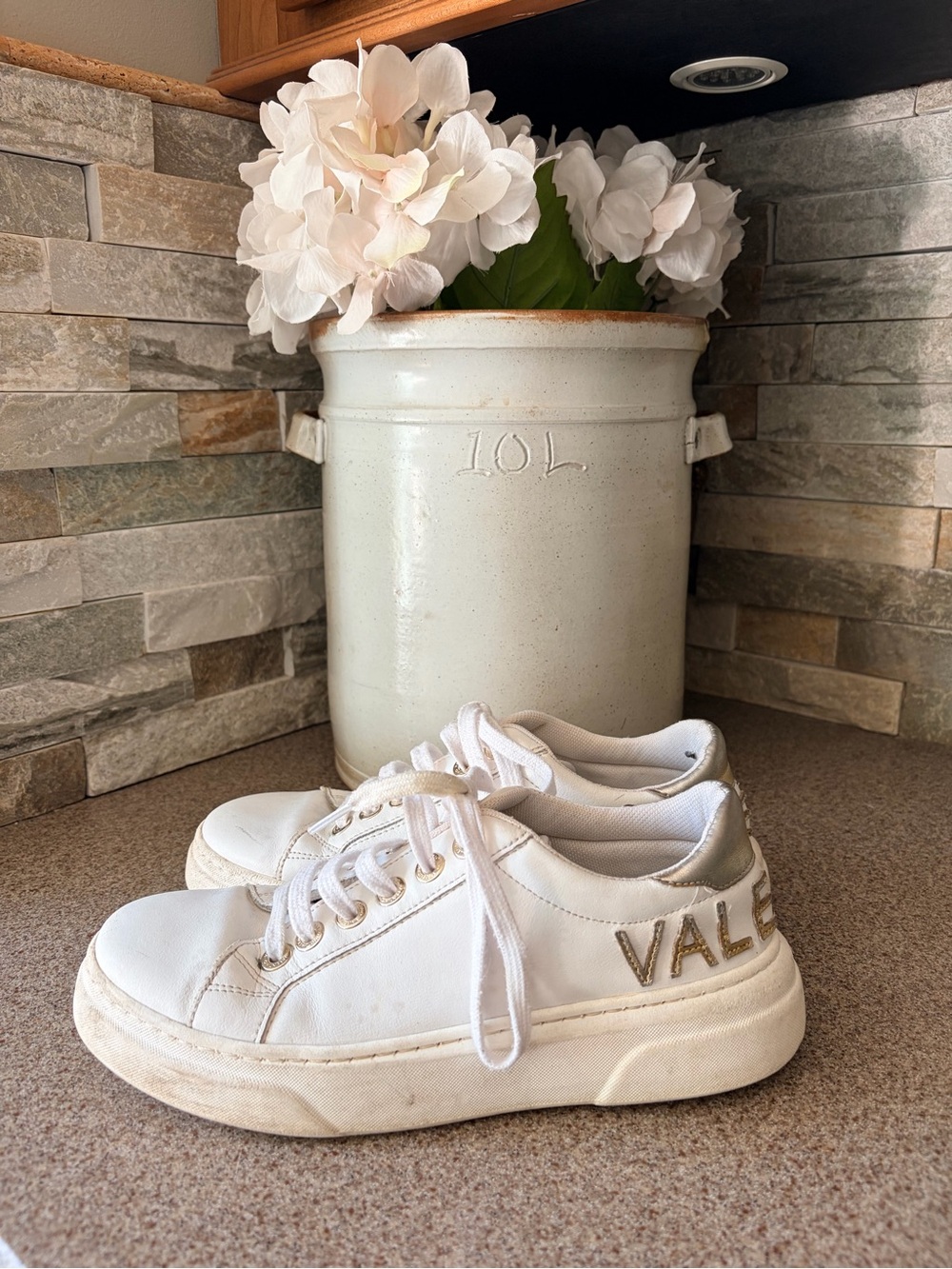 Valentino White Low-Top Sneakers with Gold Accents